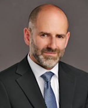Headshot of Jon Stockman, ESQ